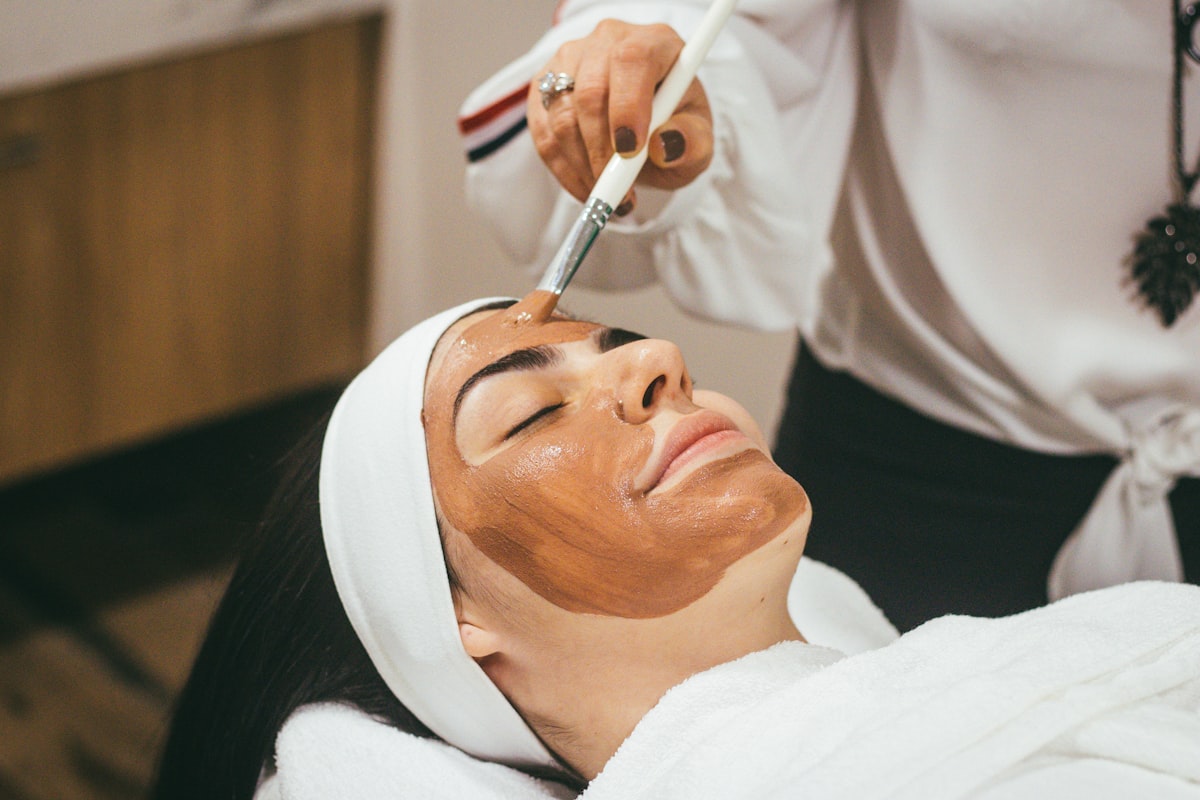 Med spa aesthetician applying a facial treatment